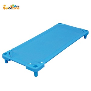 plastic cot bed